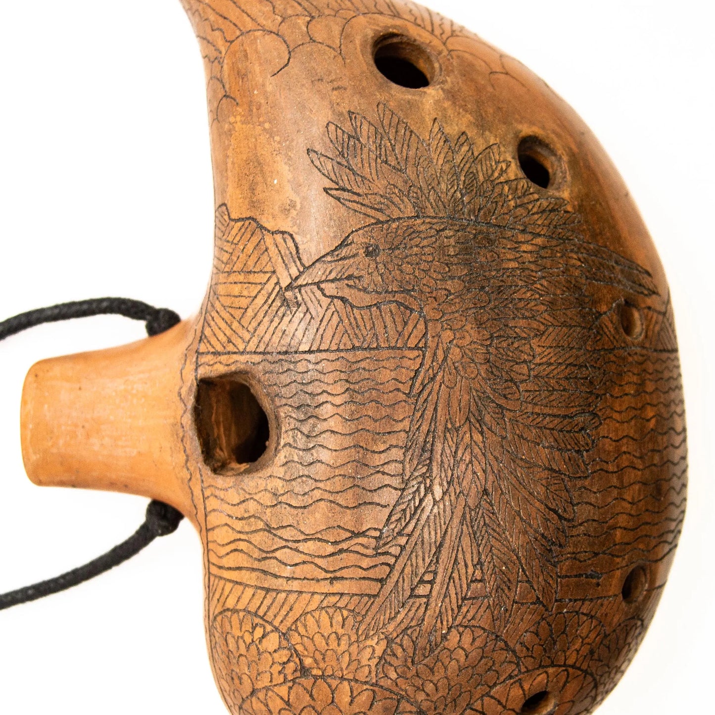 Ceramic Ocarina Journey of an Old Raven. Handmade Clay Flute with an Engraved Drawing of a Flying Raven in a Landscape.
