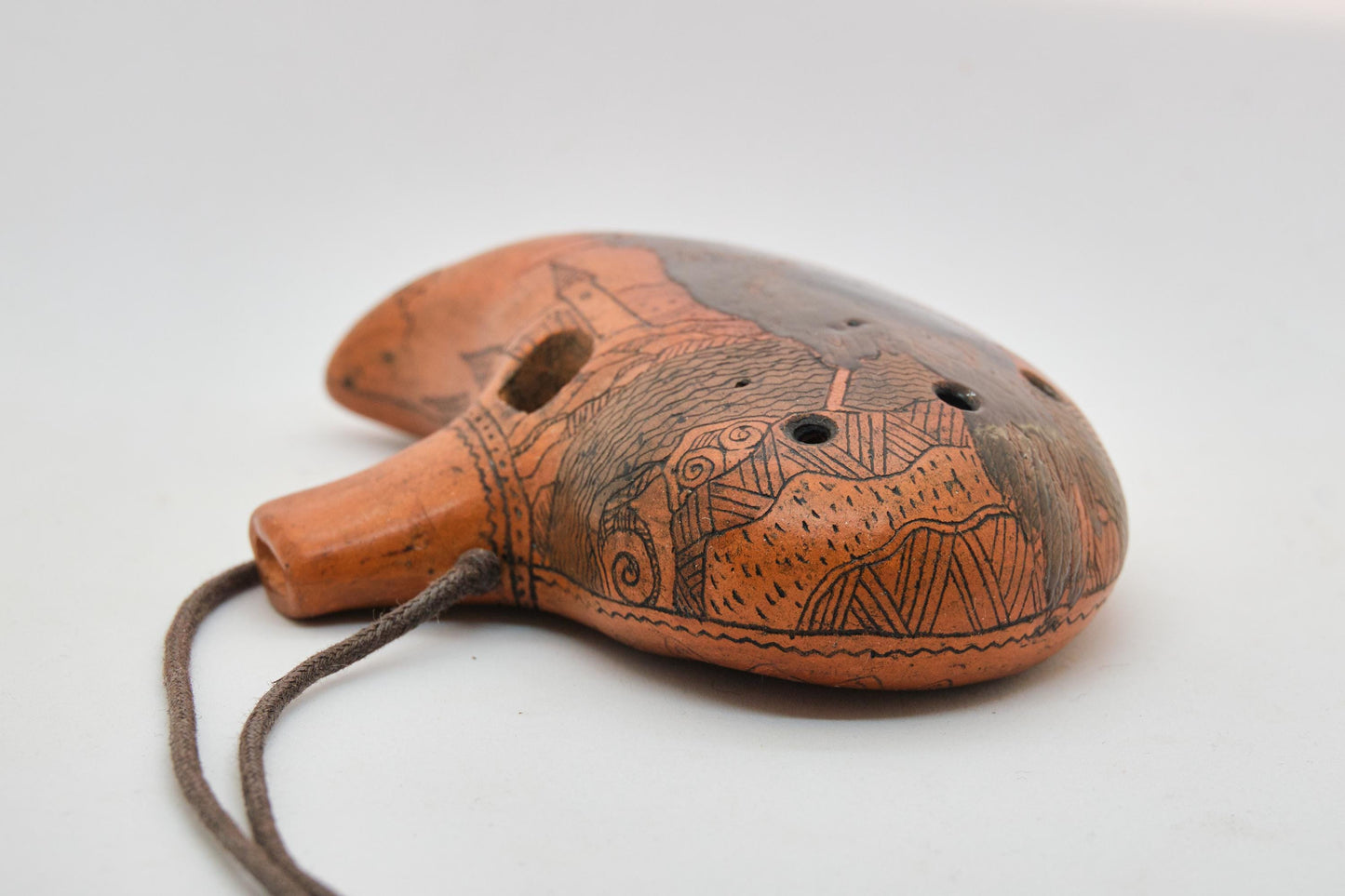 Ceramic Ocarina Raven and Castle. Clay Flute with Hand Engraving in Fantasy Style