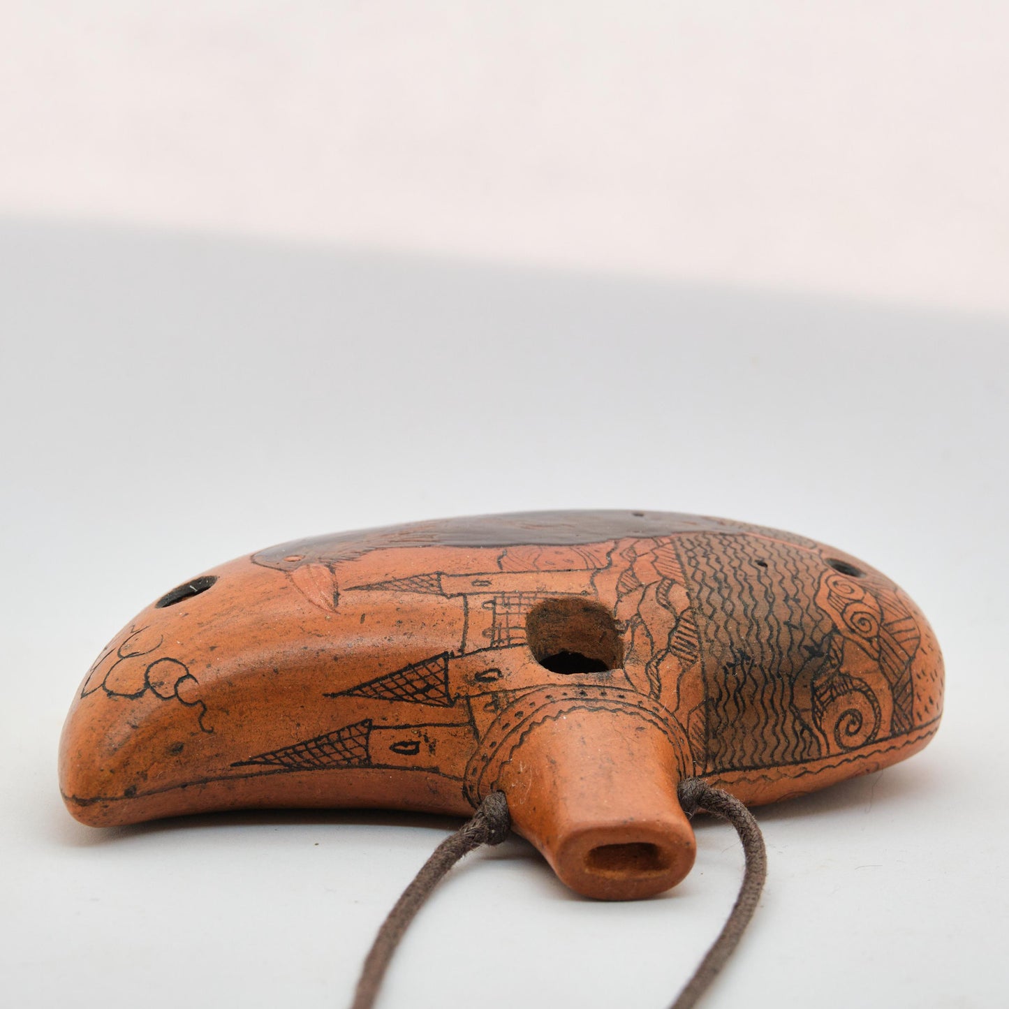 Ceramic Ocarina Raven and Castle. Clay Flute with Hand Engraving in Fantasy Style