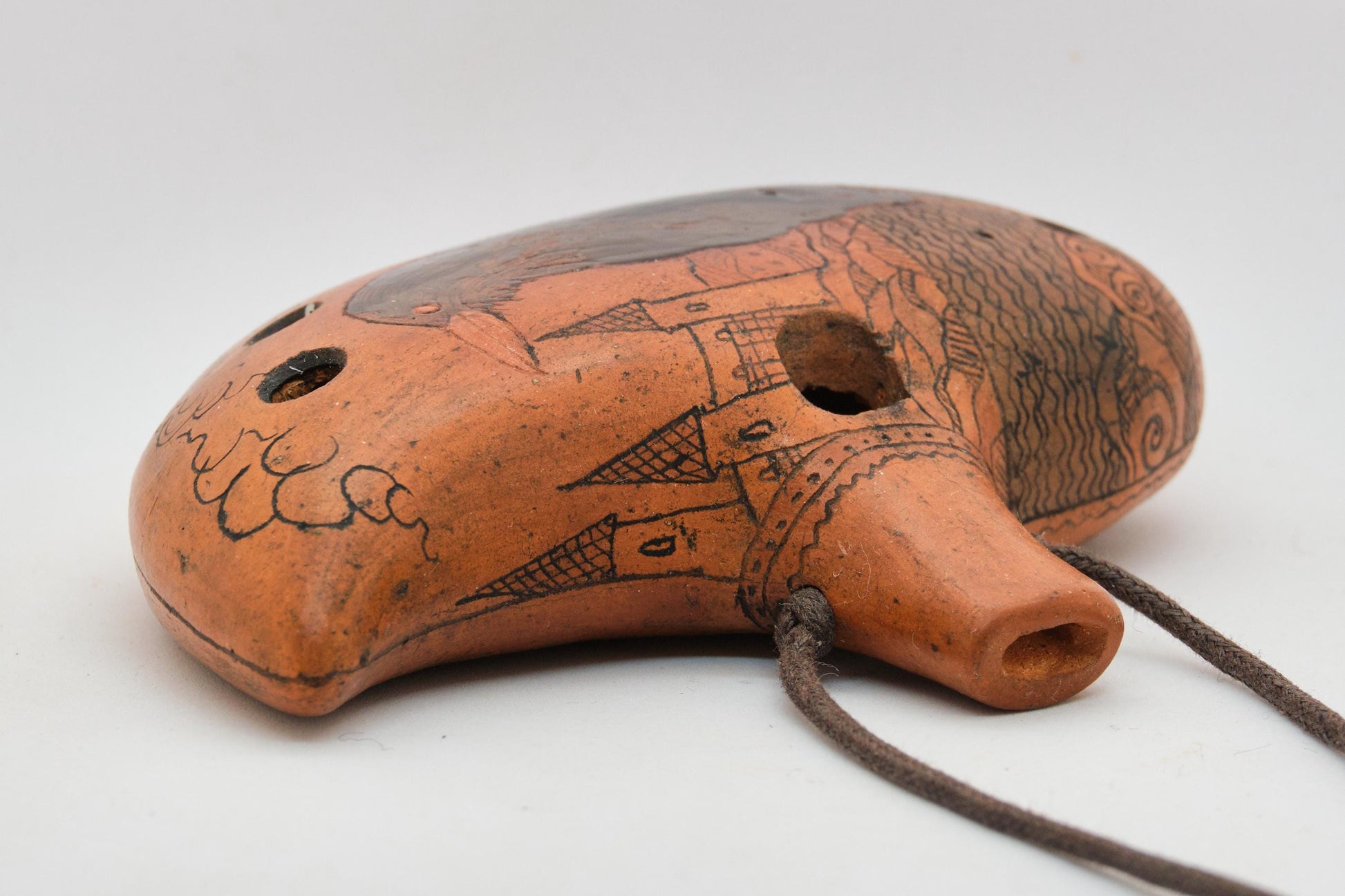 Ceramic Ocarina Raven and Castle. Clay Flute with Hand Engraving in Fantasy Style