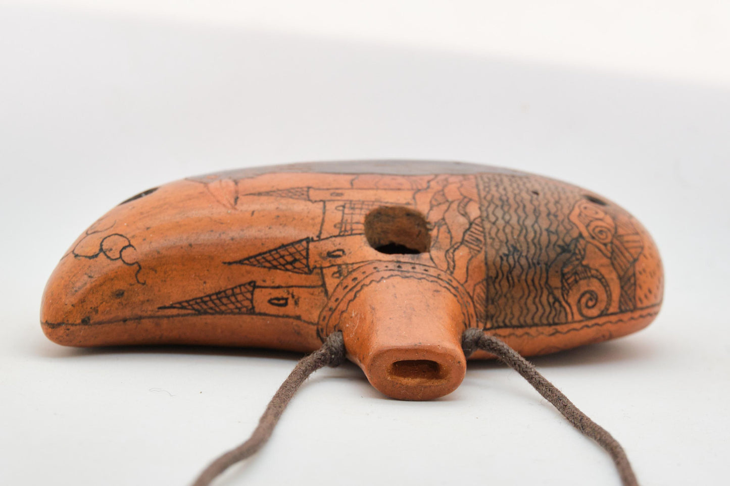 Ceramic Ocarina Raven and Castle. Clay Flute with Hand Engraving in Fantasy Style