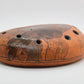 Ceramic Ocarina Raven and Castle. Clay Flute with Hand Engraving in Fantasy Style
