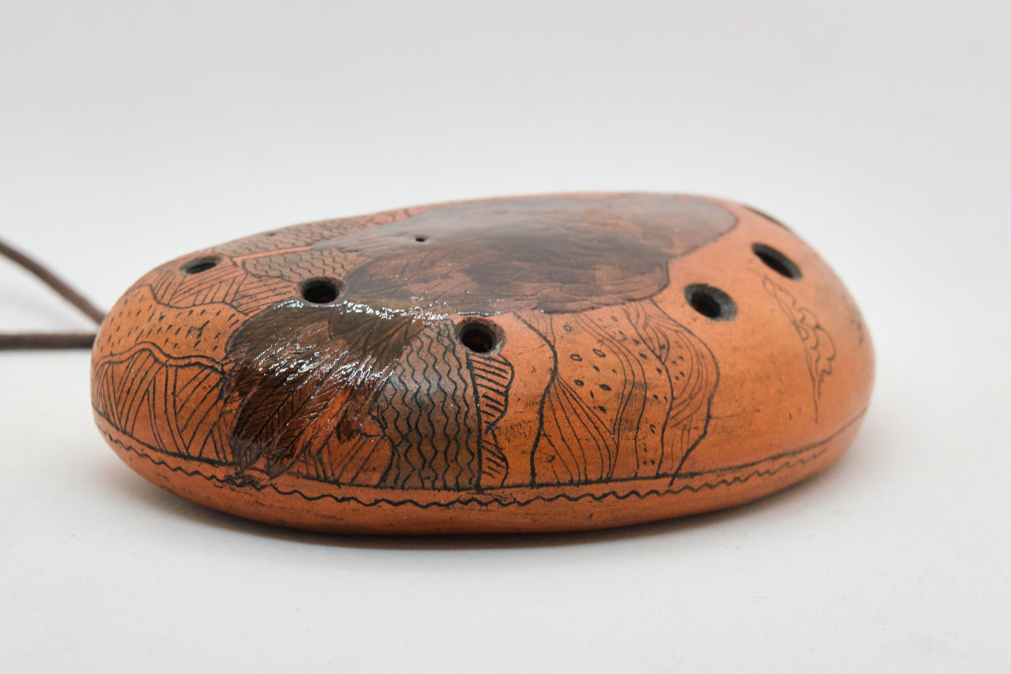 Ceramic Ocarina Raven and Castle. Clay Flute with Hand Engraving in Fantasy Style
