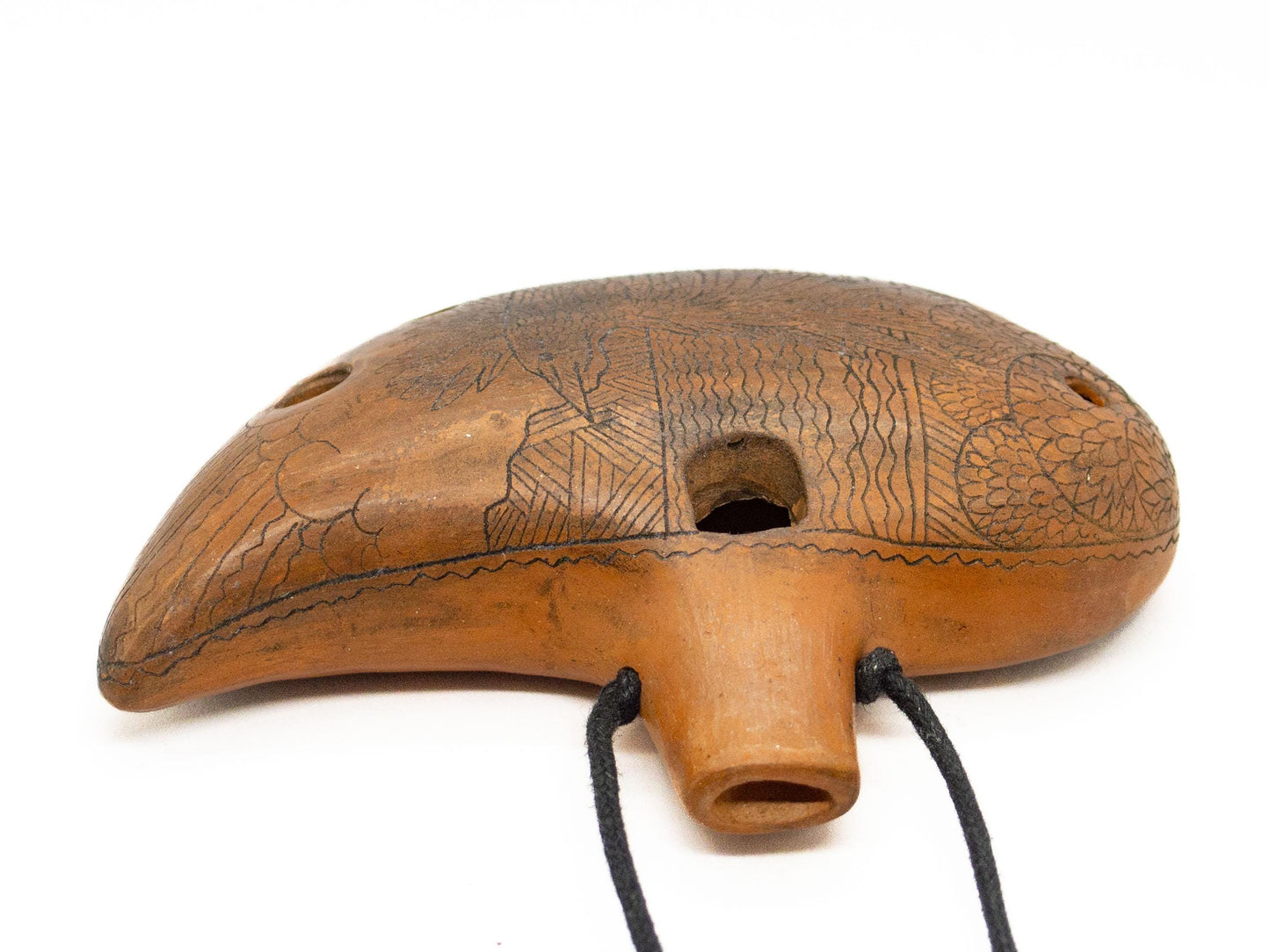 Ceramic Ocarina Journey of an Old Raven. Handmade Clay Flute with an Engraved Drawing of a Flying Raven in a Landscape.