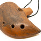 Ceramic Ocarina Journey of an Old Raven. Handmade Clay Flute with an Engraved Drawing of a Flying Raven in a Landscape.