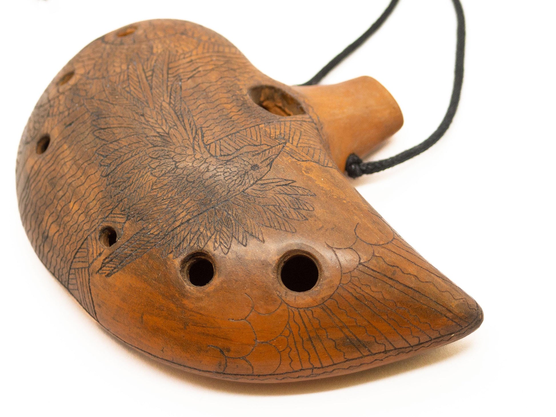 Ceramic Ocarina Journey of an Old Raven. Handmade Clay Flute with an Engraved Drawing of a Flying Raven in a Landscape.